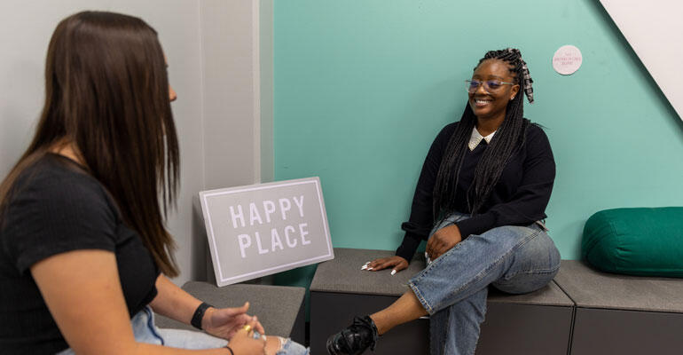 wellness coach talking with a student